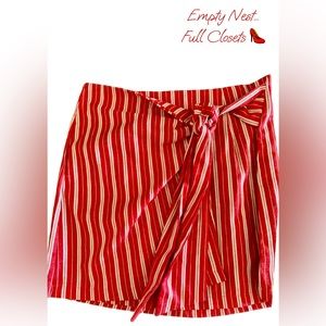 Boutique She + Sky rust colored wrap skirt with stripes. Preppy and fun. Small